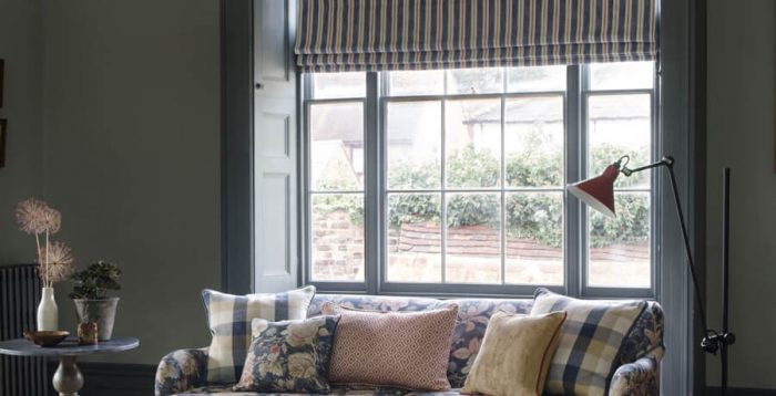 Dark striped Roman Blind inset into living room window