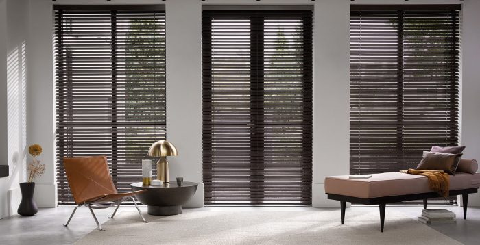 Dark timber venetians filtering light
